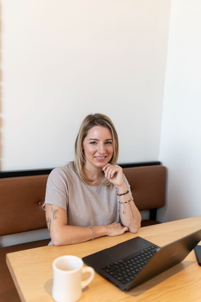 Nicole at her desk